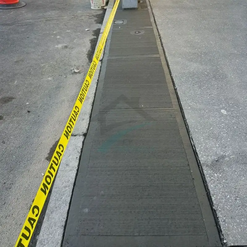 repaired sidewalk making nyc walkway safer